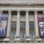 Banners of U.S. President Donald Trump and President Abraham Lincoln reading &#8220;Growing America Since 1862&#8221; hang over the entrance to the United States Department of Agriculture (USDA) in Washington, D.C., U.S., May 15, 2025. Photo: REUTERS/Kevin Lamarque/File Photo
