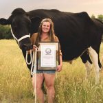 Jasmine Entz with her steer, Beef, who holds the Guinness Book of World Records title of tallest steer. Photo: Submitted