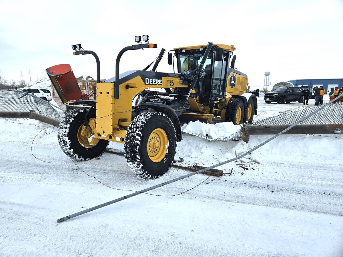 RCMP released this photograph in January 2025 after being called to the scene of an attempted theft in progress of a grader in Portage la Prairie. The grader was crashed through a fence during the incident. Photo: RCMP
