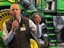 Jahmy Hindman, chief technology officer at John Deere in front of a 9R tractor at Agritechnica 2025. Photo: John Greig