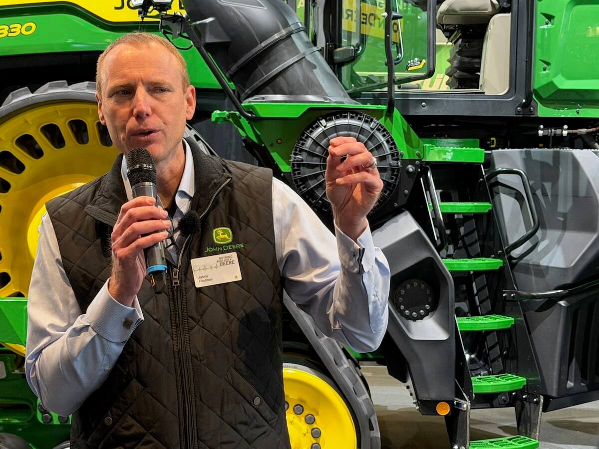 Jahmy Hindman, chief technology officer at John Deere in front of a 9R tractor at Agritechnica 2025. Photo: John Greig