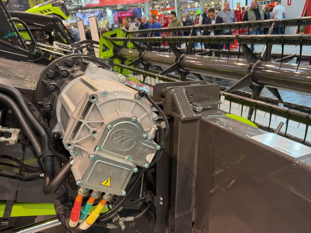 This motor runs the feeder housing and head on a Zoomlion concept combine.