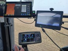 Multiple screens have become the hallmark of the modern tractor, combine or other farm equipment cab as precision, farm data and digital technology become more and more a part of modern farming. Photo: Gord Gilmour