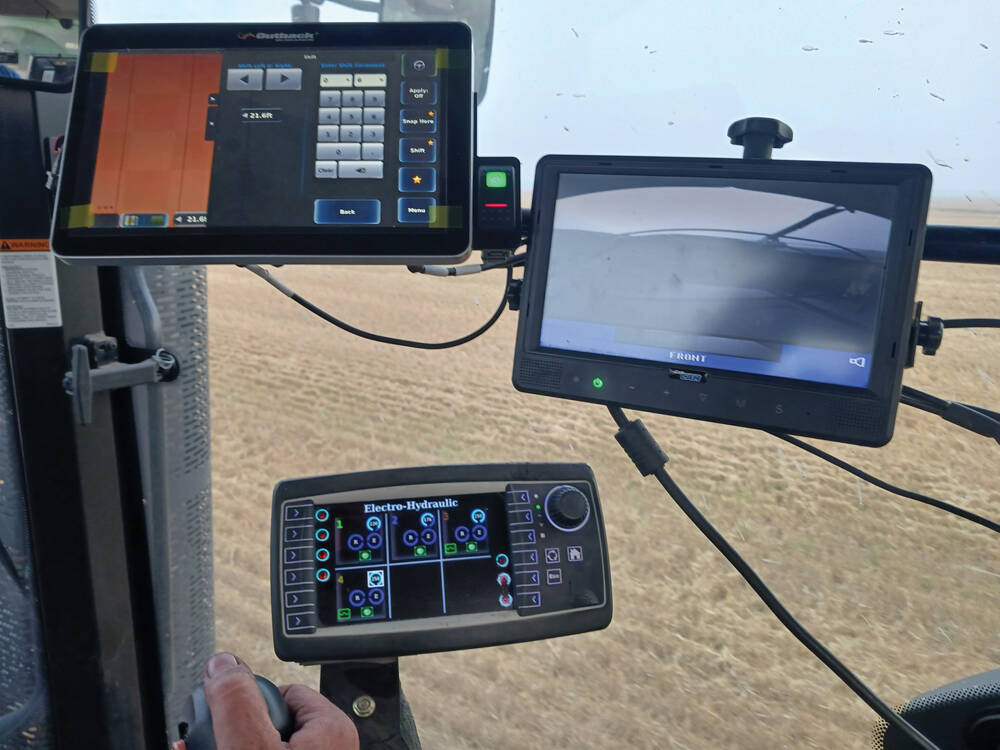Multiple screens have become the hallmark of the modern tractor, combine or other farm equipment cab as precision, farm data and digital technology become more and more a part of modern farming. Photo: Gord Gilmour