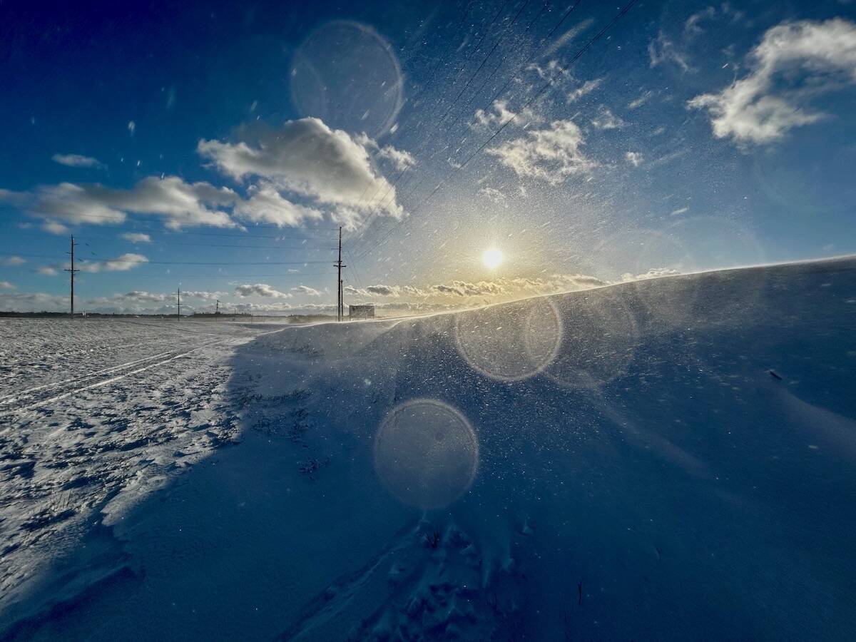 Light reflects off crystals of blowing snow during a blustery winter day near Russell, Man., December 2023.