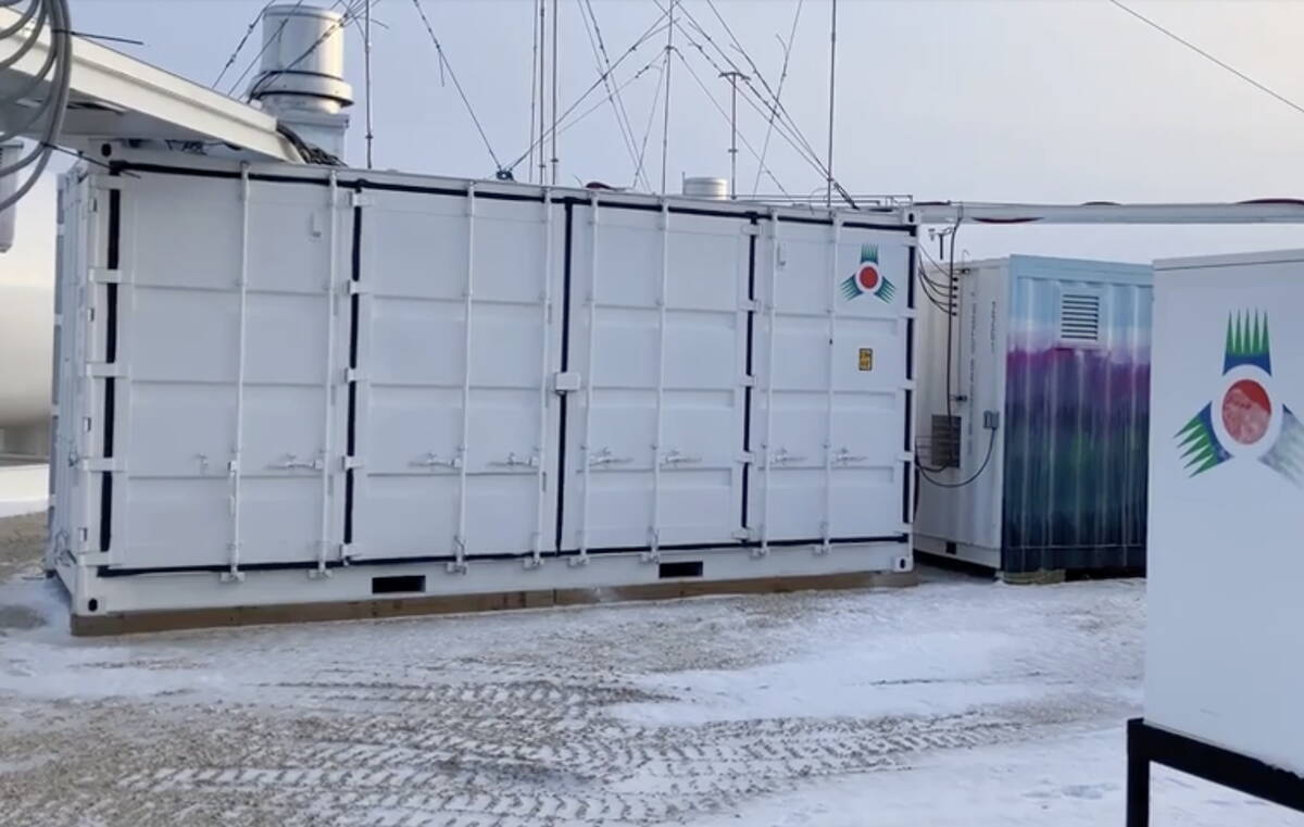 A containerized green ammonia production unit sits in a snowy Manitoba farmyard at the R&L Acres site near Sperling. Photo: file