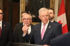 MP David Bexte speaks with reporters about Bill C-273 in Ottawa on April 15. He is surrounded by supporters. Photo: Jonah Grignon
